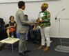 mediaitem/Mina_Owusu_from_SESDev_Liberia_presenting_a_copy_to